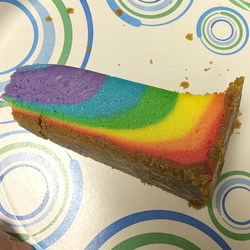 Rainbow cheesecake cut
